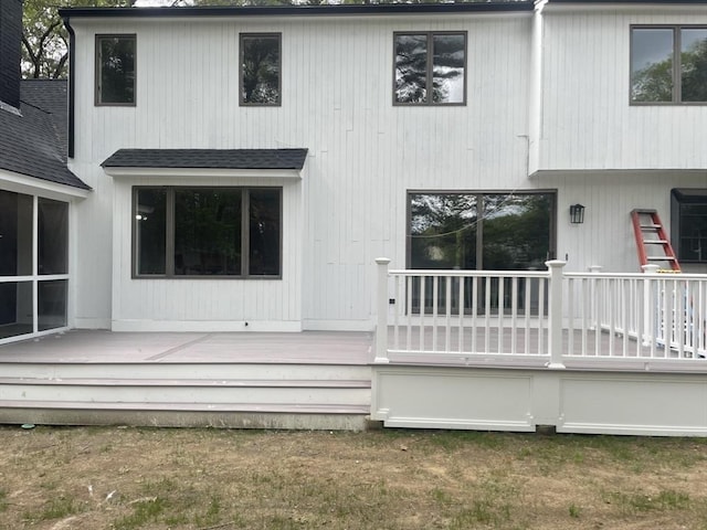47 Woodcock Ln, Marlborough, MA 01752 - back of house with a wooden deck and roof with shingles
