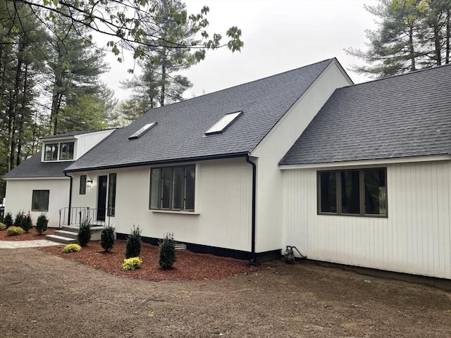47 Woodcock Ln, Marlborough, MA 01752 - view of front of property featuring a shingled roof