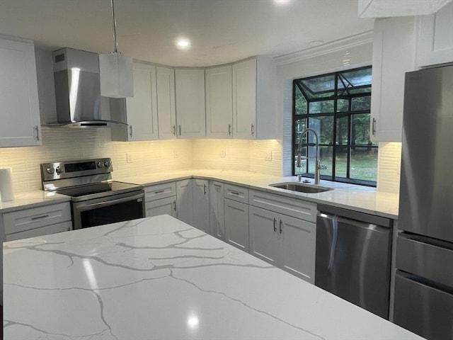 47 Woodcock Ln, Marlborough, MA 01752 - kitchen featuring stainless steel appliances, wall chimney exhaust hood, a sink, decorative backsplash, and recessed lighting