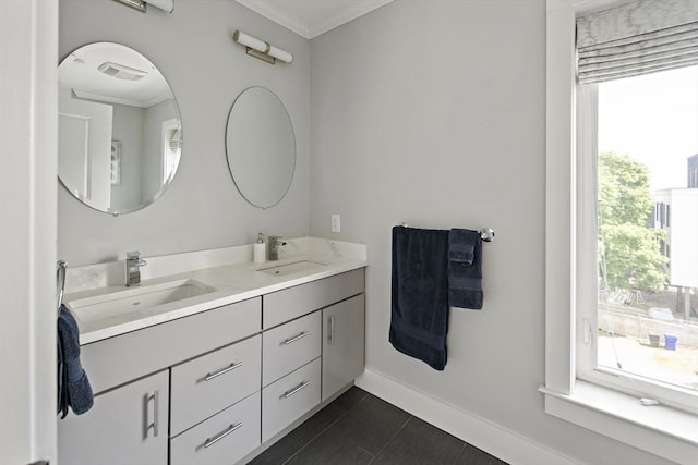 3 Ardee St Unit 3, Boston, MA 02128 - bathroom featuring ornamental molding, baseboards, and double vanity