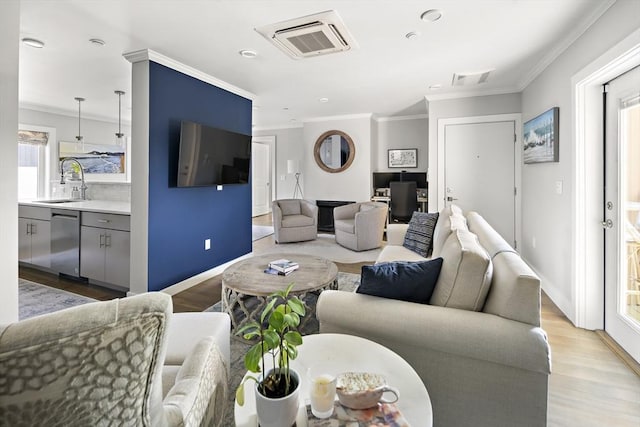 3 Ardee St Unit 3, Boston, MA 02128 - living area featuring crown molding, light wood-type flooring, baseboards, and recessed lighting