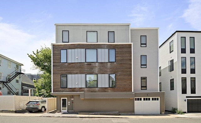 3 Ardee St Unit 3, Boston, MA 02128 - view of front of home with a garage