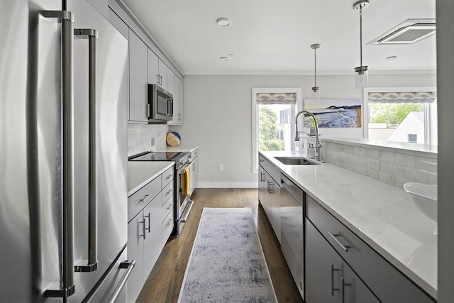 3 Ardee St Unit 3, Boston, MA 02128 - kitchen with stainless steel appliances, a sink, gray cabinets, plenty of natural light, and ornamental molding