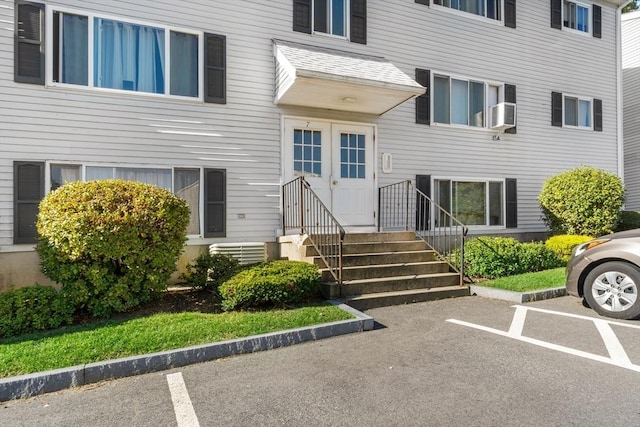 doorway to property with central air condition unit