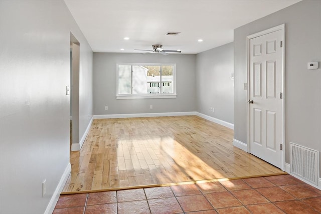 spare room featuring ceiling fan