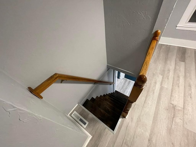 7 Coolidge St, Hudson, MA 01749 - stairway featuring wood finished floors