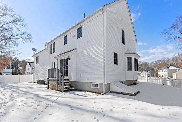 view of snow covered house