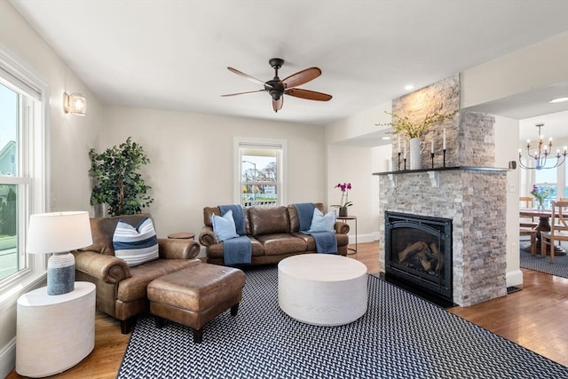 75 Puritan Rd Unit B, Swampscott, MA 01907 - living room featuring wood finished floors, a ceiling fan, a fireplace, and healthy amount of natural light