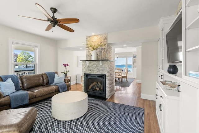75 Puritan Rd Unit B, Swampscott, MA 01907 - living room with wood finished floors, ceiling fan, baseboards, a fireplace, and recessed lighting
