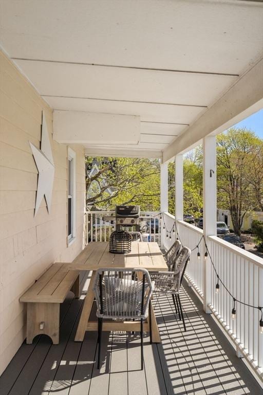 75 Puritan Rd Unit B, Swampscott, MA 01907 - wooden terrace featuring outdoor dining space and area for grilling