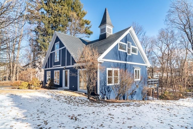 view of snow covered property