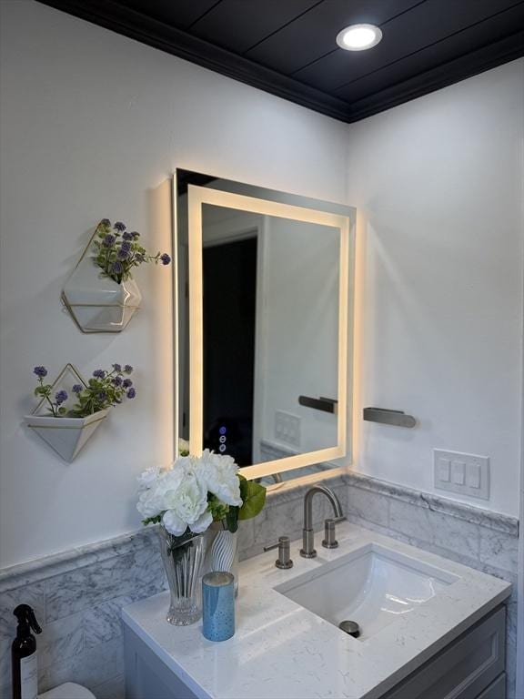 5 Cortland Dr, Hudson, MA 01749 - bathroom with tile walls, a wainscoted wall, ornamental molding, vanity, and recessed lighting