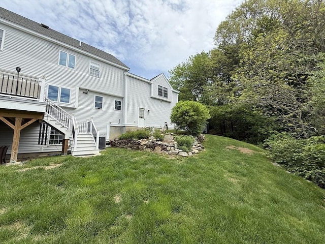 5 Cortland Dr, Hudson, MA 01749 - back of house with a lawn, stairway, and a deck