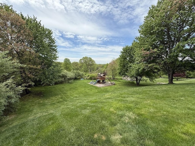 5 Cortland Dr, Hudson, MA 01749 - view of green lawn featuring a playground