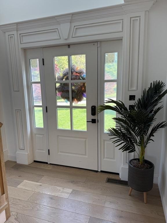 5 Cortland Dr, Hudson, MA 01749 - doorway to outside featuring light wood-style flooring