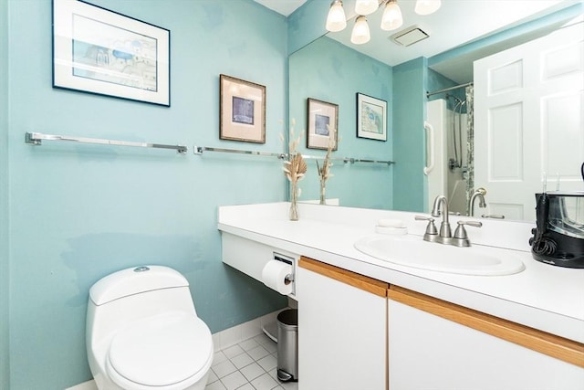 11 Church Unit 313, Salem, MA 01970 - bathroom featuring toilet, tile patterned flooring, vanity, a shower with shower curtain, and baseboards
