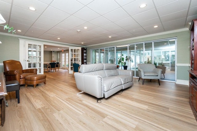 11 Church Unit 313, Salem, MA 01970 - living area with ornamental molding, light wood-type flooring, french doors, recessed lighting, and baseboards