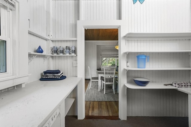 kitchen with dark hardwood / wood-style flooring