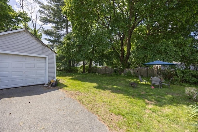 58 Howland St, Marlborough, MA 01752 - view of yard featuring driveway and an outdoor structure