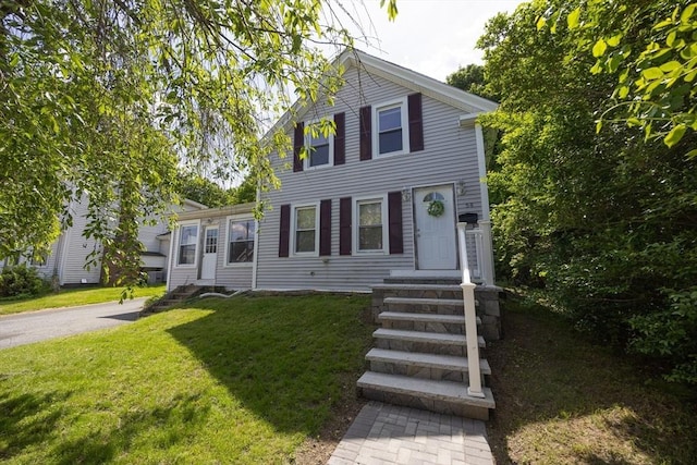 58 Howland St, Marlborough, MA 01752 - view of front of property with entry steps and a front lawn