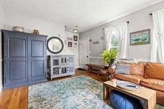 living area featuring wood finished floors