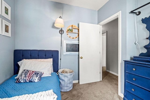 carpeted bedroom with baseboards