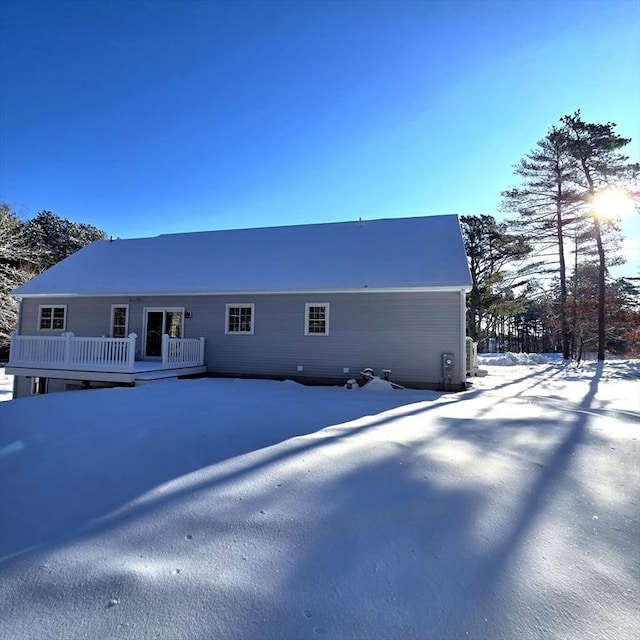 view of snow covered property