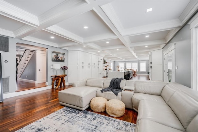 living room with hardwood / wood-style flooring, beam ceiling, and coffered ceiling