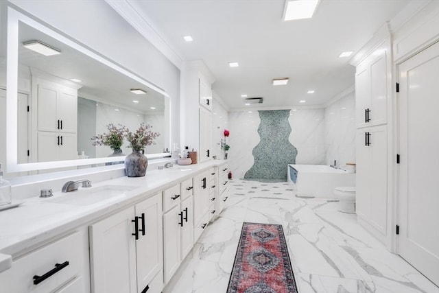 bathroom featuring toilet, a bathing tub, ornamental molding, and vanity