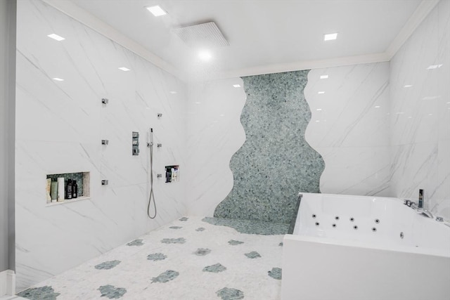 bathroom with a tub to relax in and crown molding