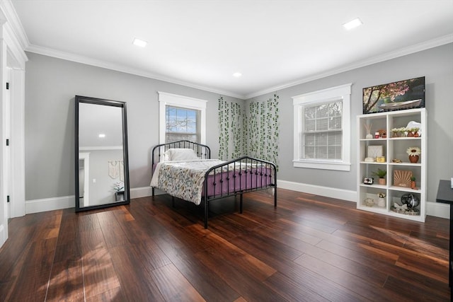 bedroom featuring dark wood-type flooring and crown molding