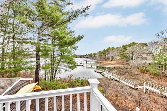 exterior space with a water view