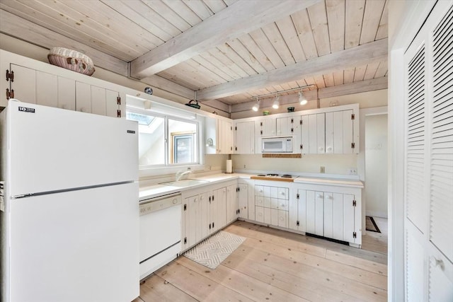 kitchen featuring beamed ceiling, white appliances, wood ceiling, light countertops, and a sink