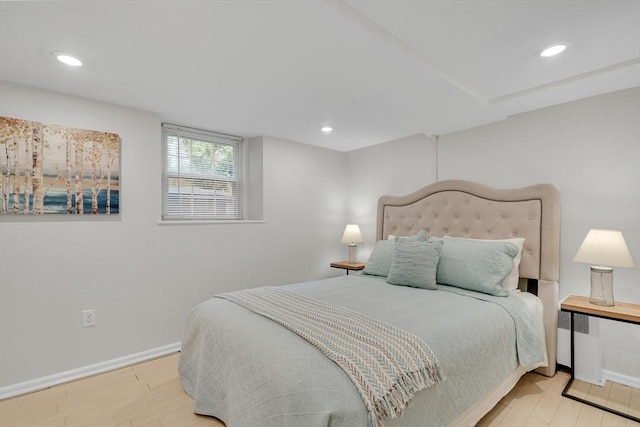 10 Shepard St Unit 2, Cambridge, MA 02139 - bedroom with wood finished floors, baseboards, and recessed lighting