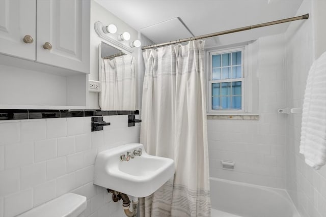 10 Shepard St Unit 2, Cambridge, MA 02139 - full bathroom featuring shower / bath combination with curtain, tile walls, and toilet