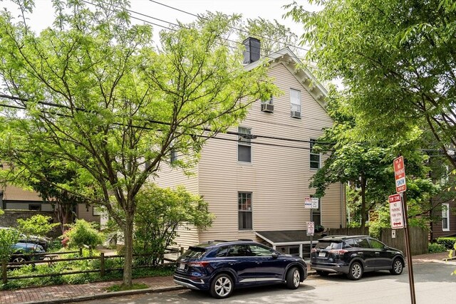 10 Shepard St Unit 2, Cambridge, MA 02139 - view of side of property featuring a chimney