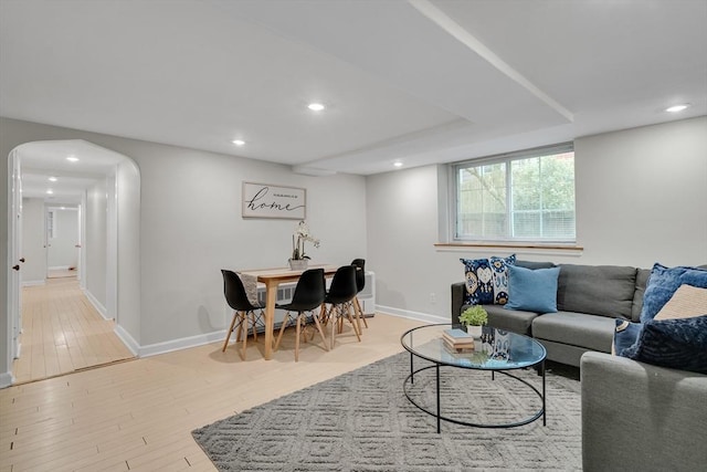 10 Shepard St Unit 2, Cambridge, MA 02139 - living room with recessed lighting, baseboards, arched walkways, and wood finished floors