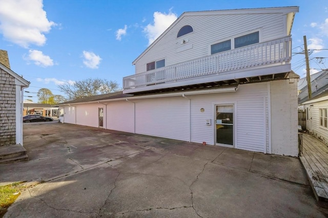 574 Main St, Barnstable, MA 02601 - back of house with a balcony