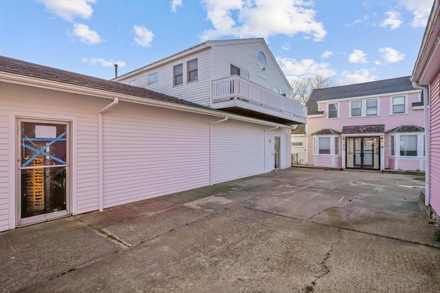 574 Main St, Barnstable, MA 02601 - view of home's exterior featuring a patio and a balcony