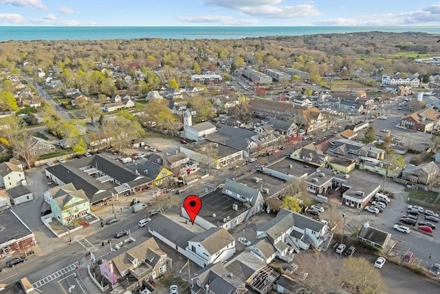 birds eye view of property featuring a residential view and a water view