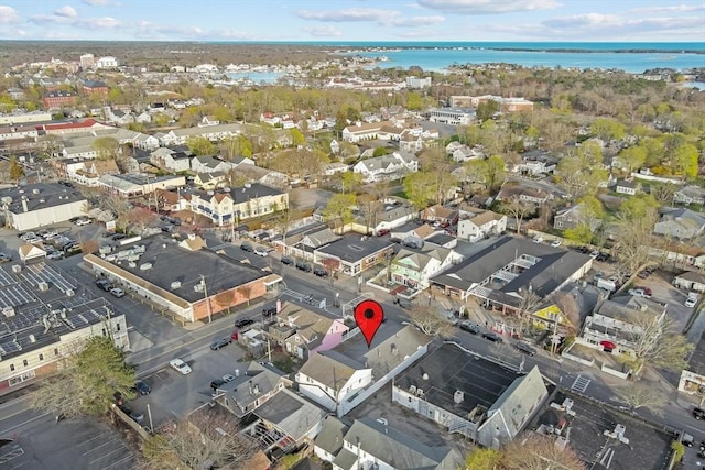 bird's eye view with a residential view and a water view