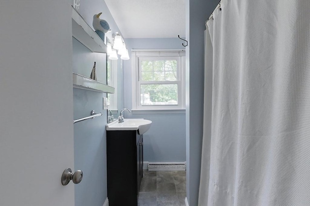 12 Pine St, Pepperell, MA 01463 - full bath featuring a baseboard heating unit and vanity