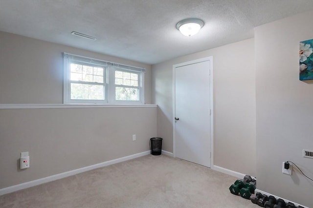 12 Pine St, Pepperell, MA 01463 - laundry room featuring carpet flooring and baseboards