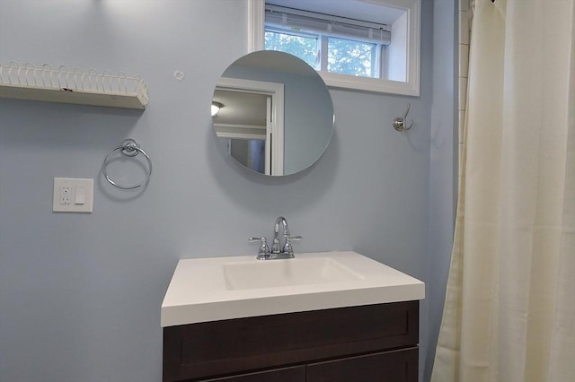 12 Pine St, Pepperell, MA 01463 - bathroom with vanity and a shower with shower curtain