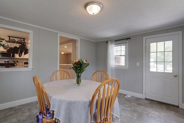 12 Pine St, Pepperell, MA 01463 - dining room with a decorative wall and ornamental molding