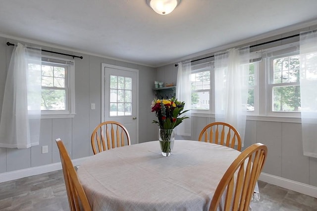 12 Pine St, Pepperell, MA 01463 - dining space featuring a decorative wall and crown molding