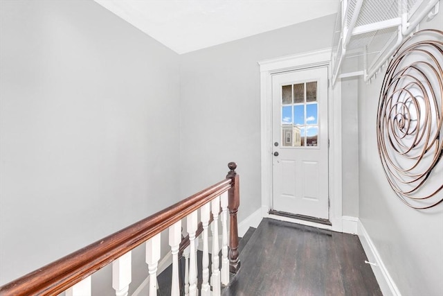 doorway featuring dark hardwood / wood-style floors