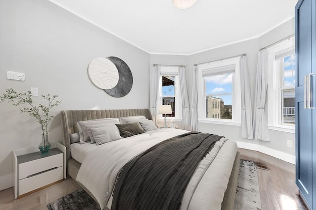 bedroom featuring hardwood / wood-style flooring