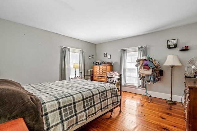 400 N Woodstock Rd, Southbridge, MA 01550 - bedroom with radiator heating unit, baseboards, and hardwood / wood-style flooring