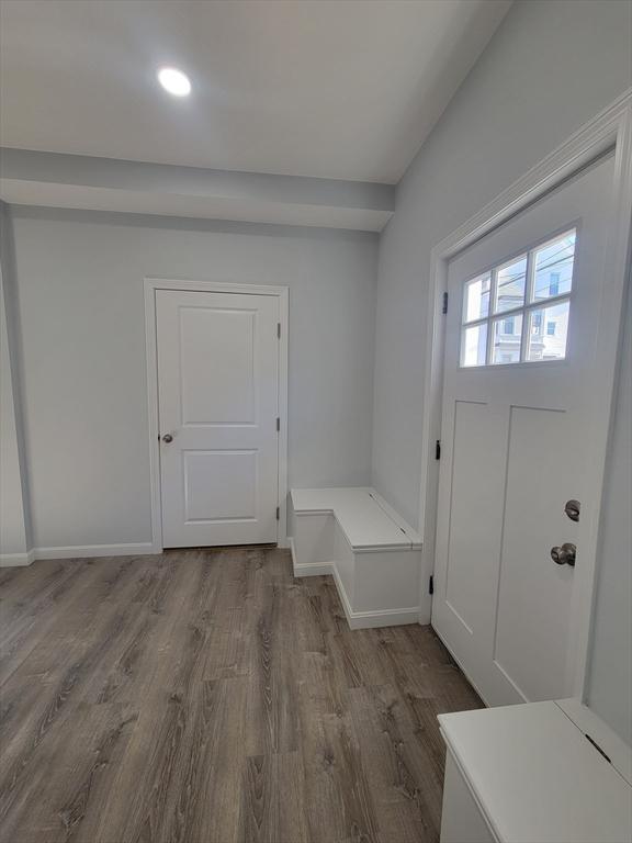 mudroom with wood-type flooring